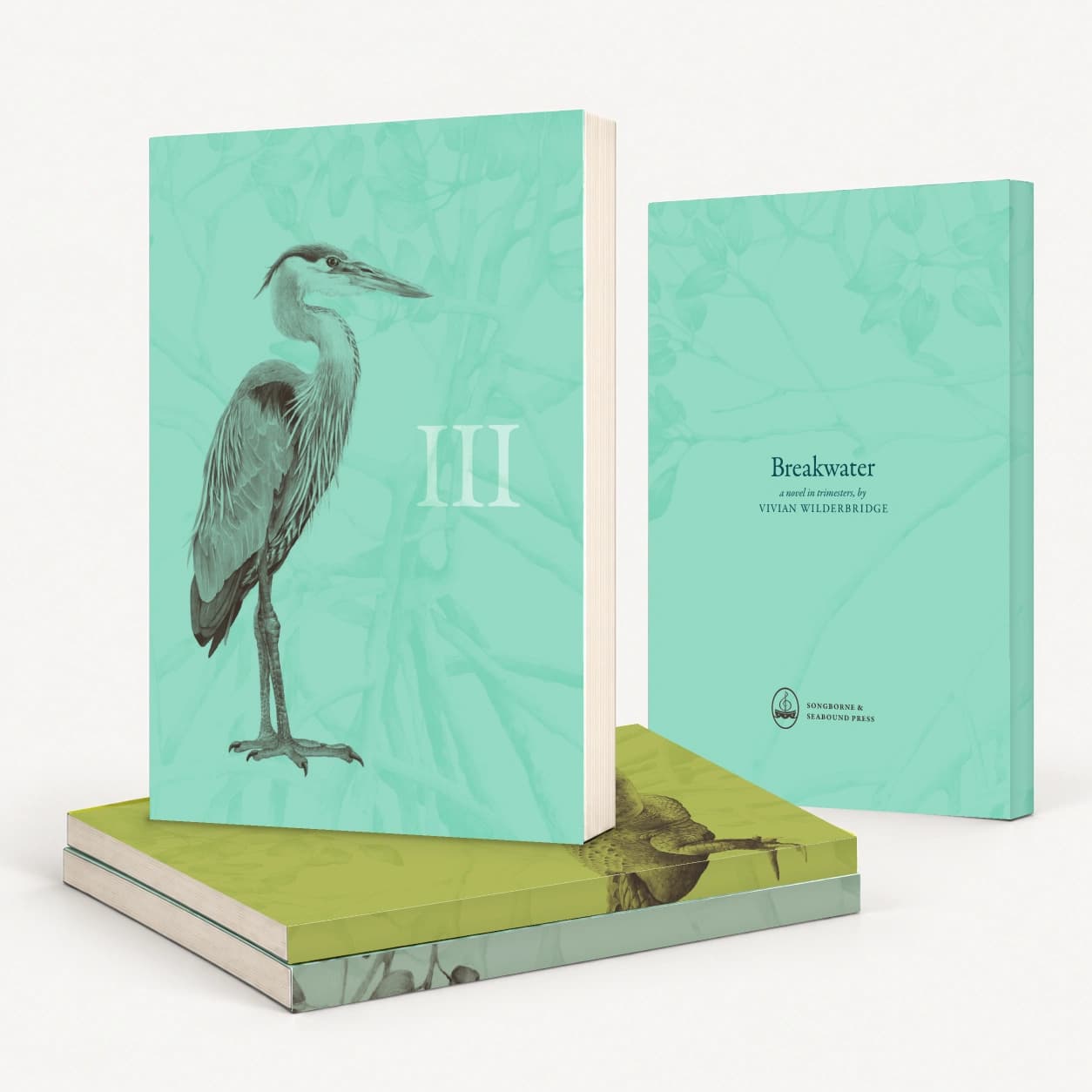 Breakwater Book III with a great blue heron cover standing on Books I and II, with its matching back cover alongside